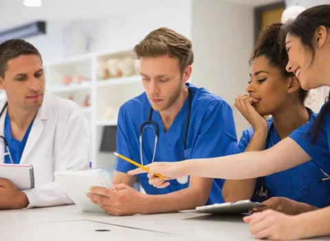 depositphotos_65278673-stock-photo-medical-students-sitting-and-talking